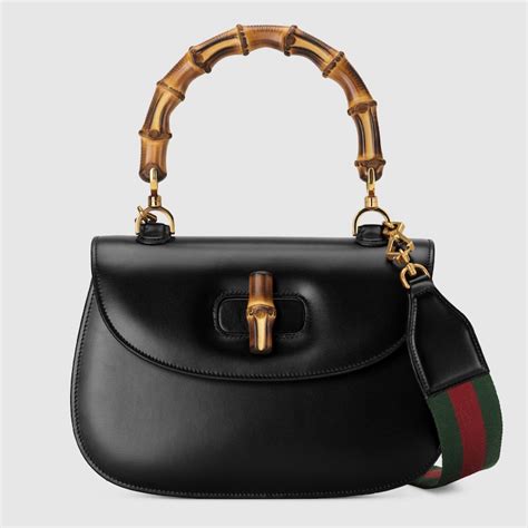 drappeggio pelle e bamboo borsa gucci|La storia della Gucci Bamboo 1947, un oggetto che è diventato .